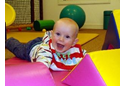 happy visitor to soft play area
