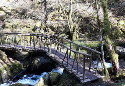 Alpine Bridge over river in Hafod