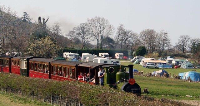 Talyllyn Train passing the tents and tourers